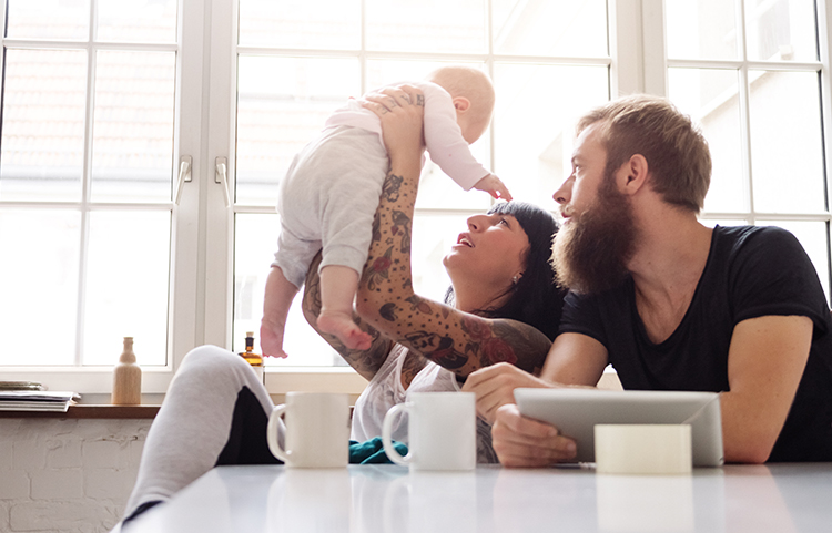 Young couple with their new born baby